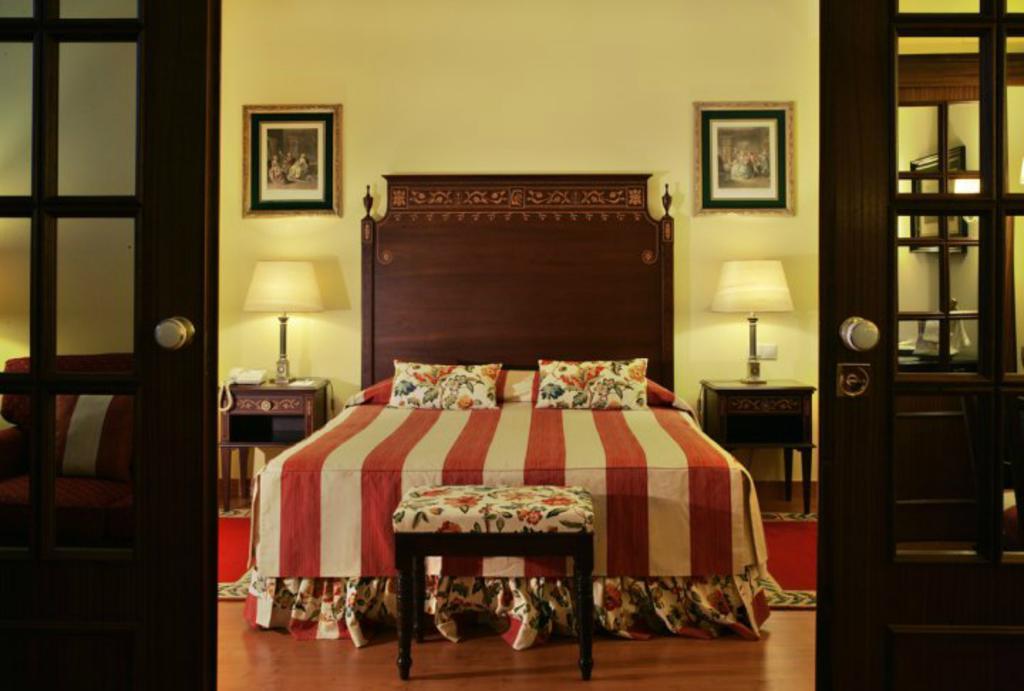 فندق آفينيدا بالاس Lisboa الغرفة الصورة A bedroom at the hotel