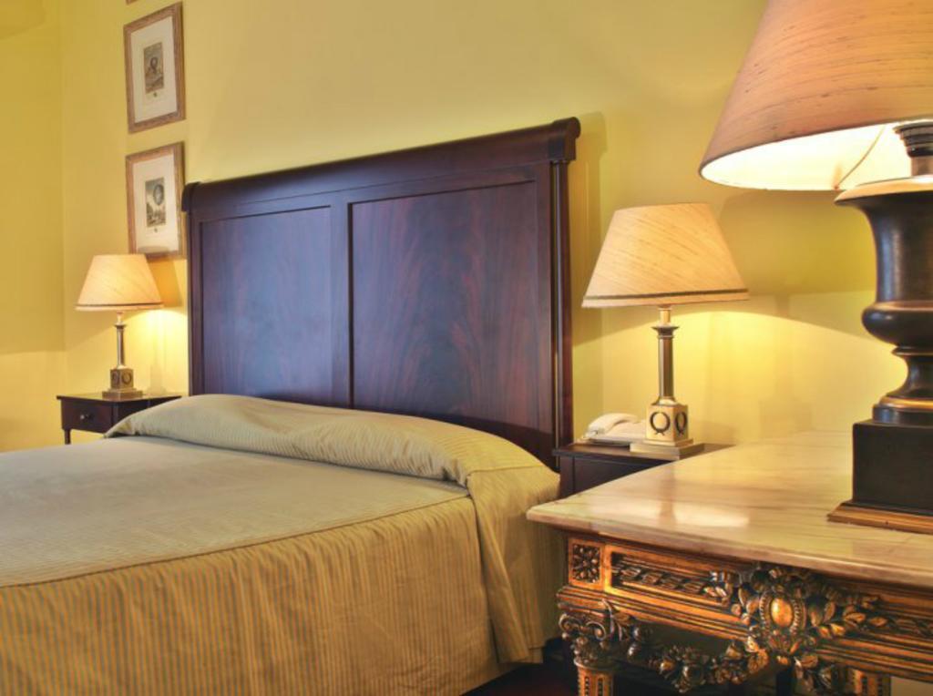 فندق آفينيدا بالاس Lisboa الغرفة الصورة A bedroom at the hotel